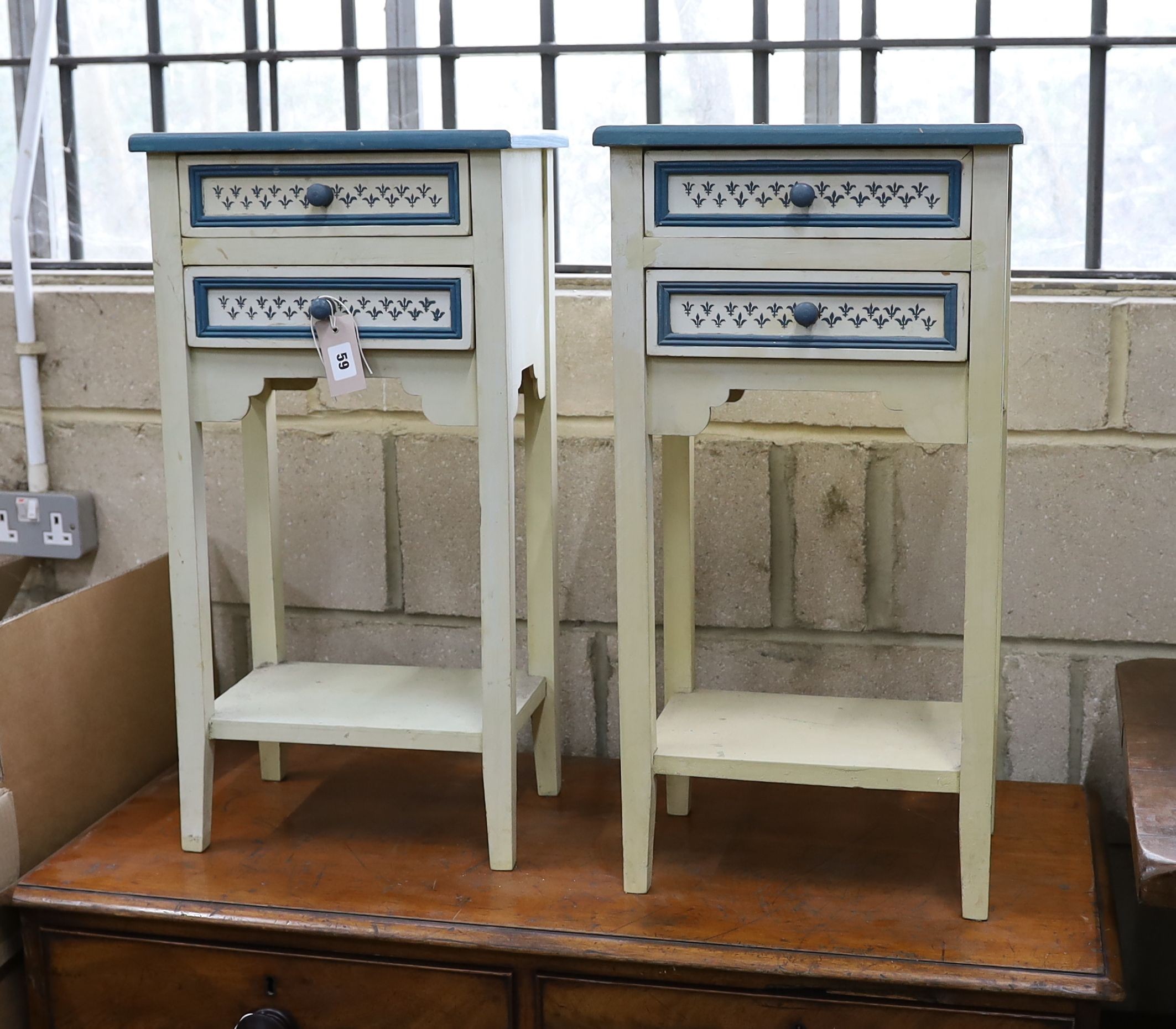 A pair of painted bedside chests, width 35cm, depth 25cm, height 69cm